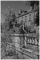 Balustrade, blossoms, and house, Filoli estate. Woodside,  California, USA (black and white)