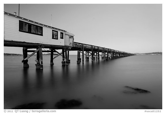 Long pier at sunset, San Pablo Bay. San Pablo Bay, California, USA