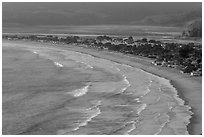 Surf, beach and town from above. California, USA (black and white)