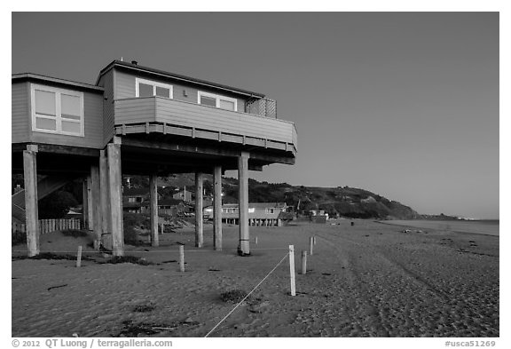Beach house with high stilts, Stinson Beach. California, USA (black and white)