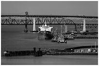 Pier, oil tanker, and Benicia-Martinez bridge. Martinez, California, USA (black and white)