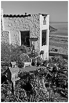 Garden, cottage, and beach. Capitola, California, USA ( black and white)