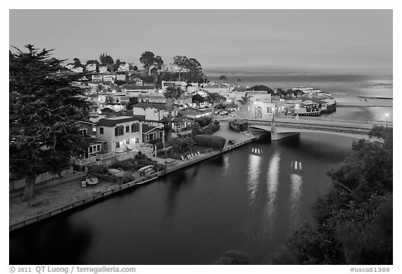 Bridges over Soquel Creek and village at dusk. Capitola, California, USA (black and white)