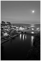 Moon rising over Soquel Creek and Ocean. Capitola, California, USA (black and white)