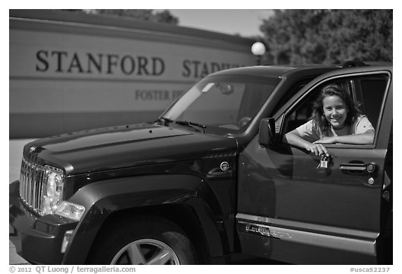 Student with new car. Stanford University, California, USA (black and white)