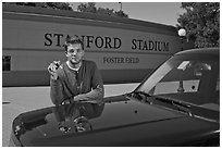 Student showing car keys. Stanford University, California, USA ( black and white)