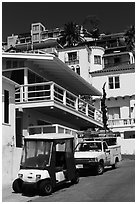 Golf cart and hillside houses, Avalon, Santa Catalina Island. California, USA ( black and white)