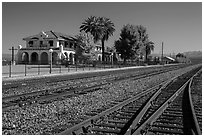 Kelso Depot across railroad tracks. Mojave National Preserve, California, USA ( black and white)