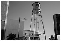 Water tower, old and new buildings, Studios at Paramount. Hollywood, Los Angeles, California, USA (black and white)