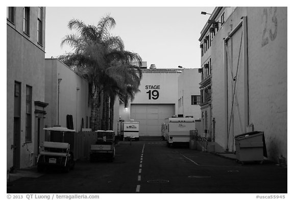 Carts, production trails, and stages at dusk, Paramount lot. Hollywood, Los Angeles, California, USA (black and white)