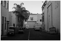Carts, production trails, and stages at dusk, Paramount lot. Hollywood, Los Angeles, California, USA (black and white)