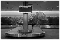Baggage claim area and Half-Dome mural, Fresno Yosemite Airport. California, USA ( black and white)