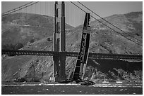 Oracle Team USA defender America's cup boat and Golden Gate Bridge. San Francisco, California, USA ( black and white)