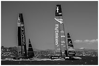 New Zealand boat leading USA boat on first downwind leg of decisive race. San Francisco, California, USA ( black and white)
