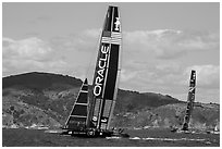 USA boat leading New Zealand boat during upwind leg of America's cup final race. San Francisco, California, USA (black and white)