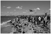 Spectators cheering during America's Cup decisive race. San Francisco, California, USA (black and white)