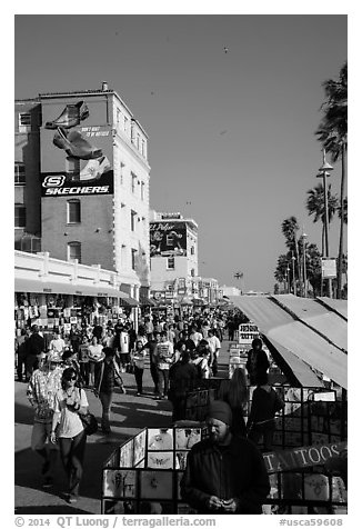Crowded Ocean Front Walk in summer. Venice, Los Angeles, California, USA (black and white)