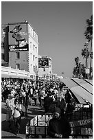 Crowded Ocean Front Walk in summer. Venice, Los Angeles, California, USA ( black and white)