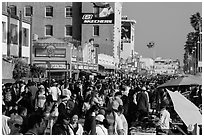 Ocean Front Walk with throngs of people. Venice, Los Angeles, California, USA ( black and white)