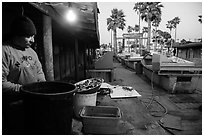Fisherman, beachside fishing cooperative. Newport Beach, Orange County, California, USA ( black and white)
