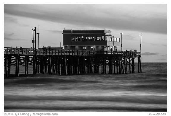 Newport Pier and restaurant at sunset. Newport Beach, Orange County, California, USA (black and white)