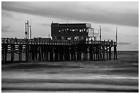 Newport Pier and restaurant at sunset. Newport Beach, Orange County, California, USA ( black and white)