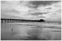 Newport Pier and clouds. Newport Beach, Orange County, California, USA ( black and white)