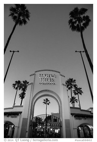 Entrance gate at dusk, Universal Studios. Universal City, Los Angeles, California, USA (black and white)