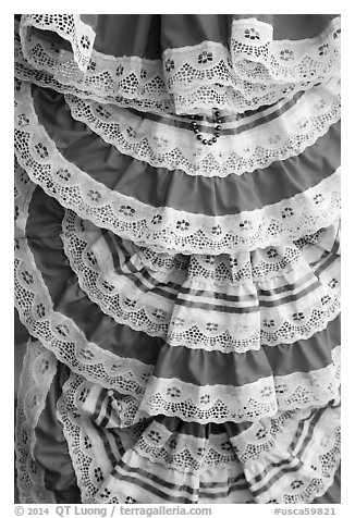 Detail of dresses with Mexican colors, El Pueblo. Los Angeles, California, USA (black and white)