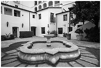 Historic Paseo courtyard and fountain. Santa Barbara, California, USA ( black and white)