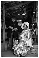 Elderly couple in period costume, Fort Tejon. California, USA ( black and white)