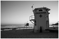 Beach and lifeguard tower at sunset. Laguna Beach, Orange County, California, USA ( black and white)