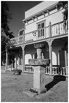 Fountain and Zanetta House, San Juan Bautista State Historical Park. San Juan Bautista, California, USA ( black and white)