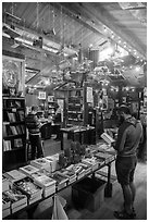 Visitors browsing books, Henry Miller Memorial Library. Big Sur, California, USA ( black and white)