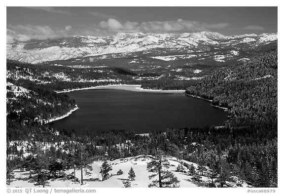 Donner Lake and snowy mountains in winter. California, USA (black and white)
