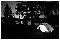 Tent and Prosser Reservoir at night, Tahoe National Forest. California, USA ( black and white)