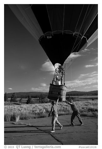 Helpers pull hot air balloon, Tahoe National Forest. California, USA (black and white)