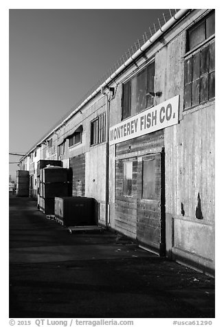 Monterey Fish Company buildings on wharf. Monterey, California, USA (black and white)