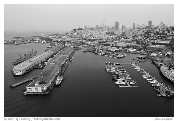 Aerial view of Pier 45 and Hyde Street Pier with skyline. San Francisco, California, USA (black and white)