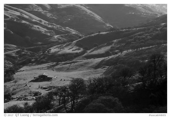 Distant view of barn in valley. Livermore, California, USA (black and white)