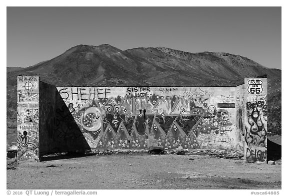 Abandonned building with graffiti along route 66. Mojave Trails National Monument, California, USA (black and white)