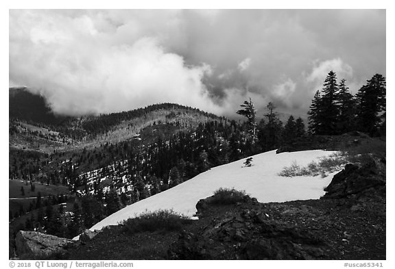 Snow patch and storm cloud near Snow Mountain summit. Berryessa Snow Mountain National Monument, California, USA (black and white)