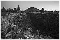 Lava depression and Schonchin Butte, dawn. Lava Beds National Monument, California, USA ( black and white)