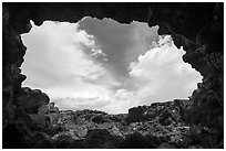 Sky from opening of lava tube cave, Pisgah lava field. Mojave Trails National Monument, California, USA ( black and white)