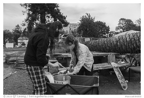 Volunteers serving meals at Peoples Park. Berkeley, California, USA (black and white)