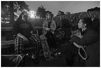 Conversation at night, Peoples Park. Berkeley, California, USA ( black and white)