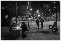 Men playing chess on Telegraph Avenue at night. Berkeley, California, USA ( black and white)