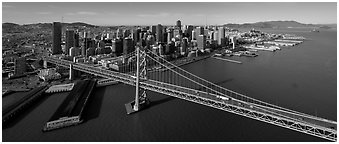 Aerial view of Bay Bridge and downtown skyline. San Francisco, California, USA (Panoramic black and white)