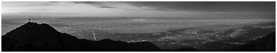 Foggy Los Angeles Basin from Mount Wilson at sunrise. Los Angeles, California, USA (Panoramic black and white)