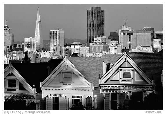 Victorians at Alamo Square and skyline, late afternoon. San Francisco, California, USA